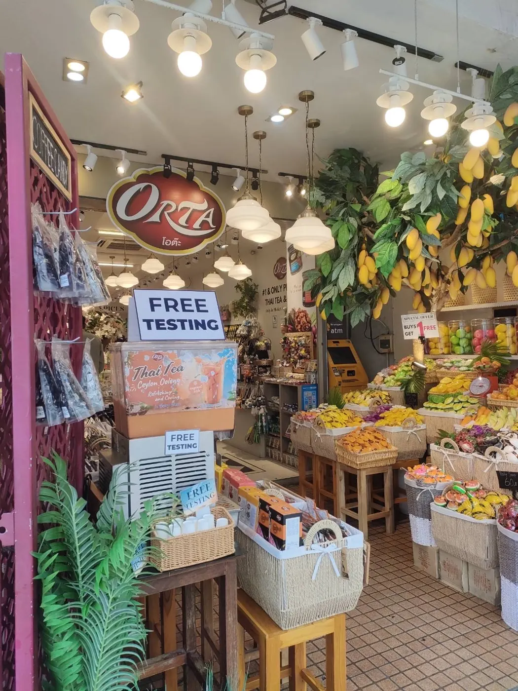 Free Thai tea tasting at the ORTA shop entrance in Phuket Old Town
