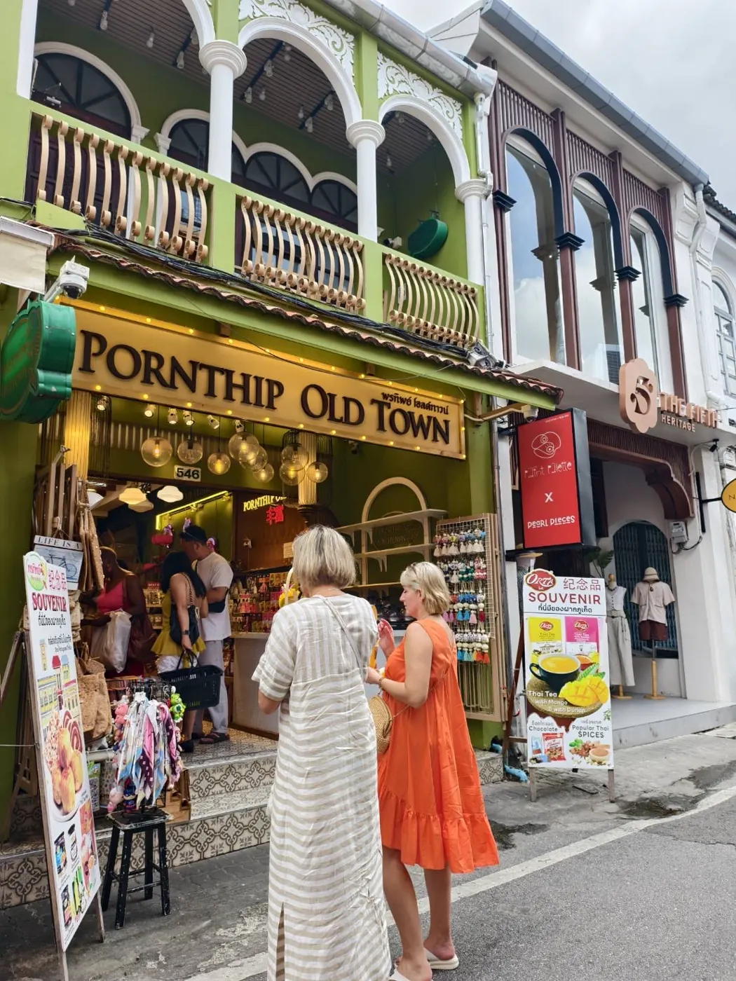 Visitors browsing outside Pornthip Old Town in Phuket